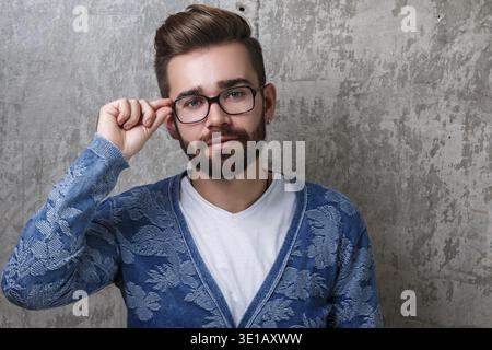 Handsome young bearded man in eyeglasses Stock Photo
