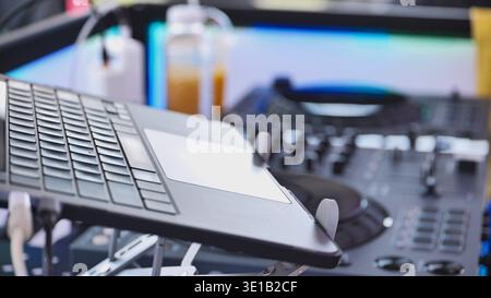 DJ setup with laptop and mixer creating music for India Day event in Moscow Stock Photo
