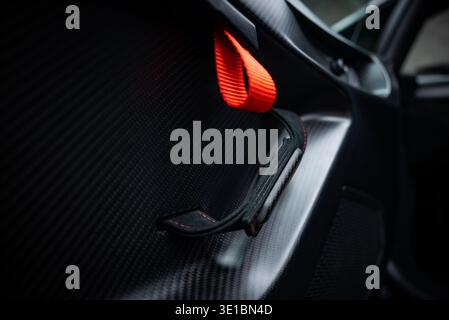 Lamborghini Huracan door panel detail with carbon fiber and strap Stock Photo