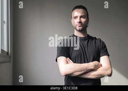 Portrait of a handsome bearded man in black t-shirt Stock Photo