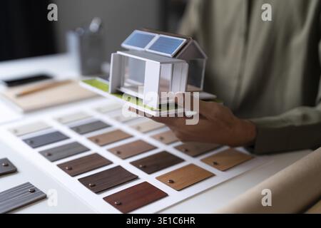 Architecture interior Man Creative project plan designer home and Choose interior materials Stock Photo
