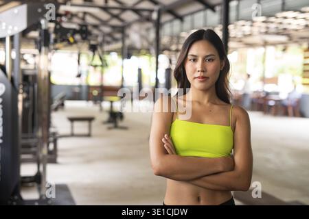 Young beautiful Asian woman at gym during summer Stock Photo