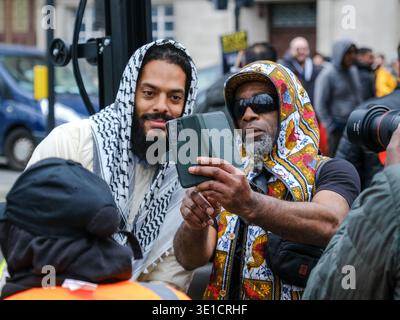 London, UK. 15th March, 2026. Vocalist Bobby Vylan, part of punk rap duo Bob Vylan speaks at the annual Al-Quds Day event along the Albert Embankment and takes photos with rally attendees. The protest this year was held as a static event after Home Secretary Shabana Mahmood approved the Met Police's request to ban the march over concerns of serious public disorder between demonstrators and counter-demonstrators. Credit: Eleventh Hour Photography/Alamy Live News . Stock Photo