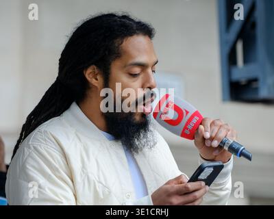London, UK. 15th March, 2026. Vocalist Bobby Vylan, part of punk rap duo Bob Vylan speaks at the annual Al-Quds Day event along the Albert Embankment and takes photos with rally attendees. The protest this year was held as a static event after Home Secretary Shabana Mahmood approved the Met Police's request to ban the march over concerns of serious public disorder between demonstrators and counter-demonstrators. Credit: Eleventh Hour Photography/Alamy Live News . Stock Photo