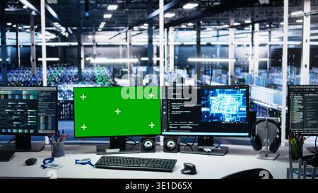 Server room chroma key PCs tracking rigs processing machine learning datasets for artificial intelligence operations. Green screen computers monitoring gear used in AI large language model development Stock Photo