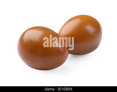 Two pickled quail eggs isolated on white Stock Photo