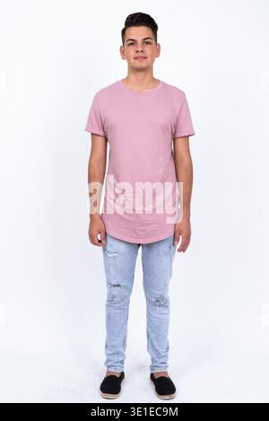 Studio shot of young handsome multi ethnic man against white background Stock Photo