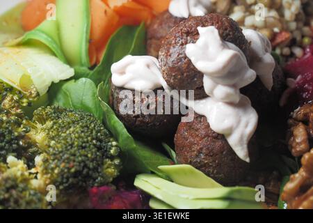 Healthy food bowl with mixed greens and veggie balls Stock Photo