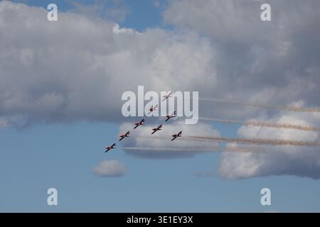 The Canadian Forces Snowbirds aerobatic team flies in formation during an airshow. Stock Photo