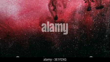 Defocused fume paint. Glitter texture. Black red silver color smoke fog pigment shimmer smog water spill on abstract art bokeh background. Stock Photo