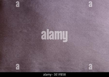 lilac fabric texture close up of soft textile surface, smooth material structure neutral cloth background with subtle color gradient concept of textil Stock Photo