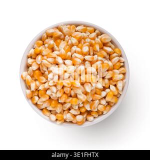 Dry corn in bowl on white background Stock Photo
