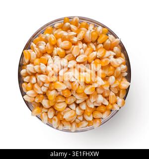 Dry corn in bowl on white background Stock Photo
