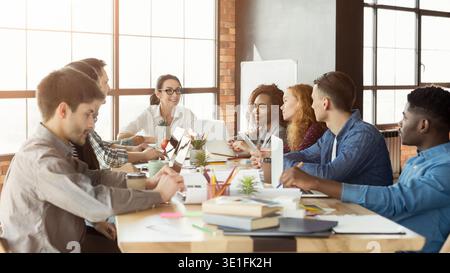 Group of young designers working with project Stock Photo