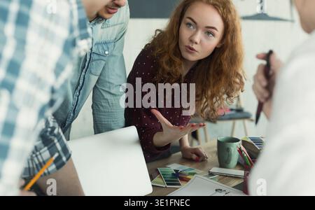 Creative designers having brainstorming meeting in office Stock Photo
