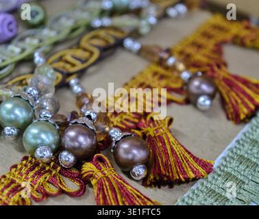 beautiful ruffles ribbons and beads for sewing and needlework. High quality photo Stock Photo