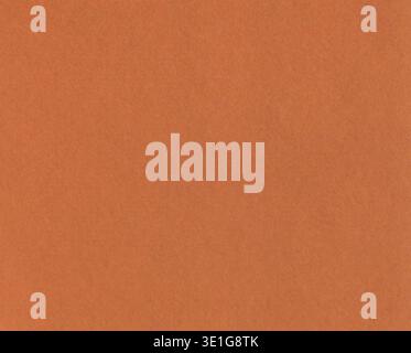 Orange textured background. Bright color textured paper surface for design cover, branding, presentation, template, flyers, poster. Vintage paper Stock Photo