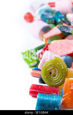 Assorted colorful candies isolated on white background Stock Photo
