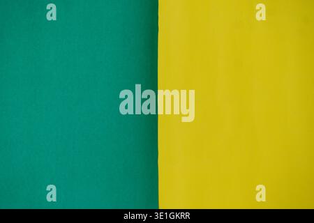 A vibrant abstract background featuring a clean vertical split between bright green and sunny yellow colors. Perfect for design, presentations, or as Stock Photo
