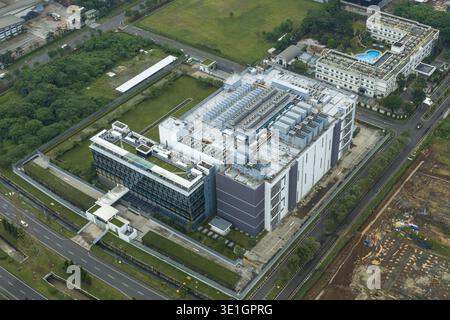 Aerial view of datacenter infrastructure providing internet connectivity and data storage services, Jakarta, Indonesia. Stock Photo