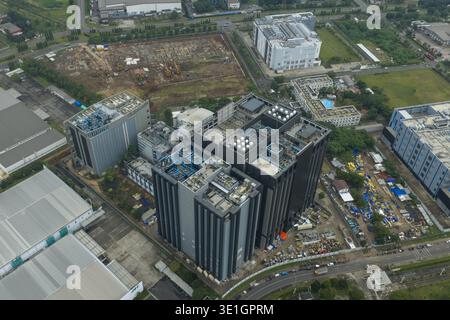 Aerial view of data center buildings with rooftop infrastructure, showing industrial area development and technology infrastructure, Jakarta, Indonesi Stock Photo