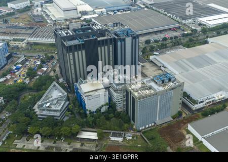 Aerial view of large data center buildings and surrounding industrial park infrastructure, Jakarta, Indonesia. Stock Photo