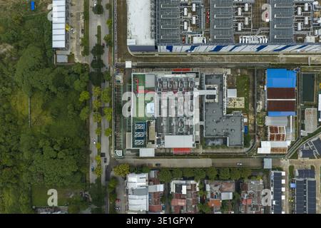 Aerial view of a large modern datacenter complex, showing rooftop cooling systems and facilities, Jakarta, Indonesia. Stock Photo