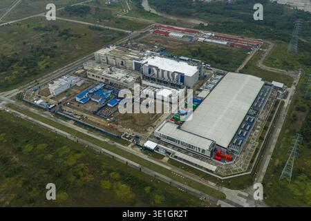 Aerial view of large ai scale data center complex under construction, showing modern technological infrastructure development and expansion, Beijing, Stock Photo