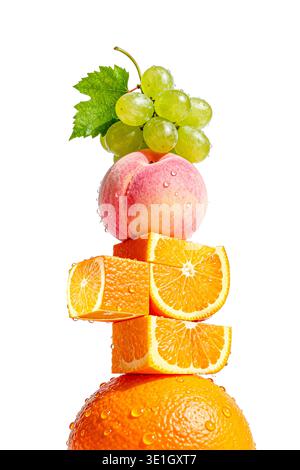 Creative Vertical Stack of Fresh Orange Slices Peach and Green Grapes with Water Drops on White Background Stock Photo