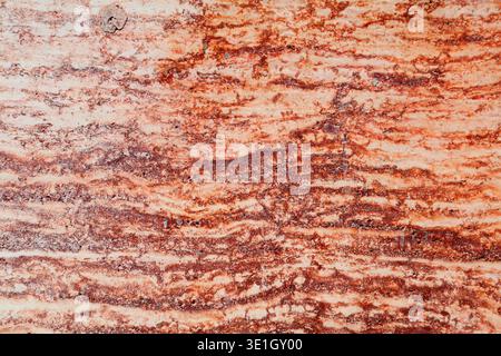 Travertine  texture background. Red travertine limestone natural stone surface backdrop. Stock Photo