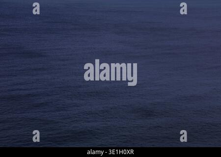 Sea water background. Dark surface of Atlantic Ocean. Abstract background. Stock Photo