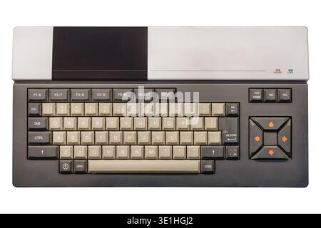 Top view of a vintage brown with beige eighties desktop personal computer isolated on a white background Stock Photo