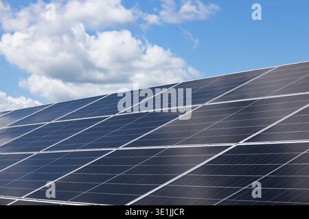 Solar panels installed on a rooftop generating clean sustainable energy Stock Photo