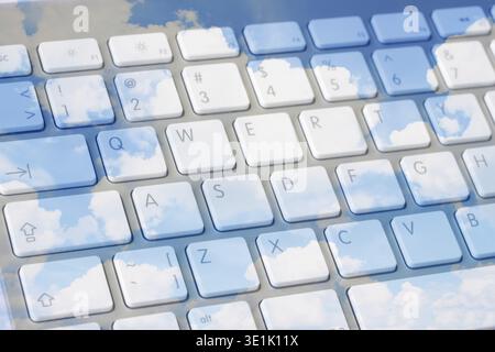 Cloud computing concept - keyboard over cloudscape Stock Photo