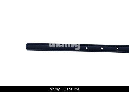 Close up of punch holes on a thin navy blue leather belt end Stock Photo
