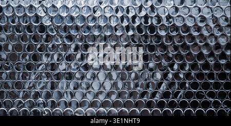 Silver reflective bubble wrap texture with circular pattern Stock Photo