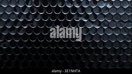Dark black metallic bubble wrap texture background Stock Photo