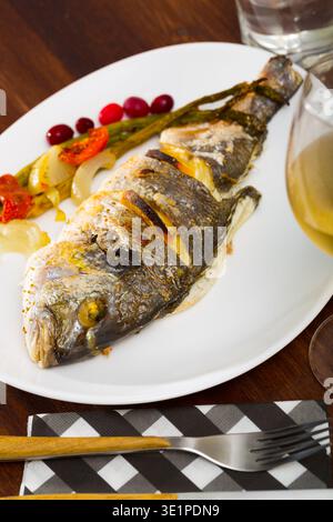 Grilled dorada with baked vegetables Stock Photo