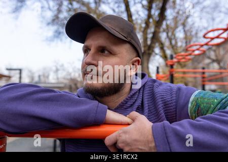 Close up portrait of man at outdoor gym Stock Photo
