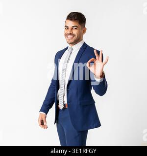Happy Arab Man Smiling And Gesturing OK Sign Stock Photo