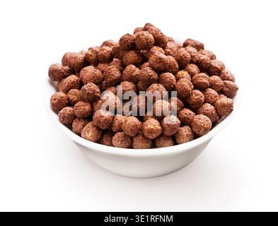 Chocolate balls in white bowl on white background Stock Photo