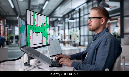 Office Fire Safety Officer Inspecting Alarm For Evacuation Readiness Compliance Stock Photo