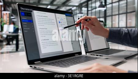 Diligent Professional Systematically Arranges Digital Documents On Laptop For Efficient Retrieval Stock Photo