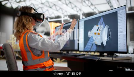 Innovative Female Engineer Creating Solar-Powered Rocket With VR Glasses Stock Photo