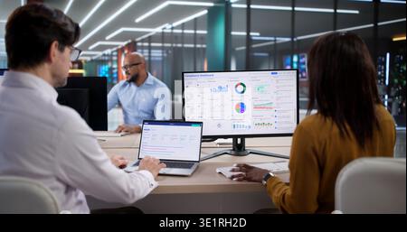 An African Woman Using A Laptop Inspects Privacy Compliance For Corporate Governance Stock Photo