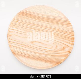 Empty circle wooden tray isolated on white background Stock Photo
