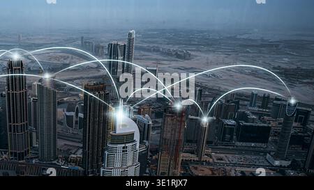 City skyline shows digital connections and technology in urban setting Stock Photo