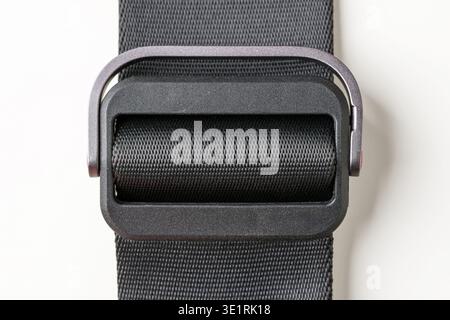 Adjustable bag strap slider showing durability and secure fastening detail Stock Photo