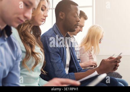Group of business people using gadgets Stock Photo