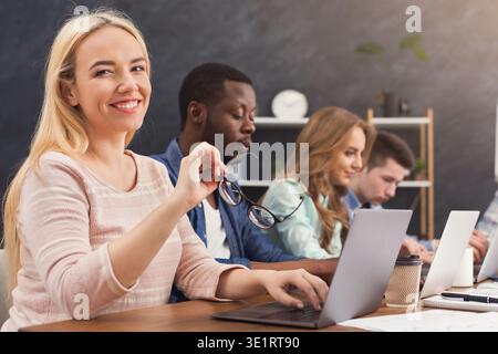 Programmers working in software developing company Stock Photo
